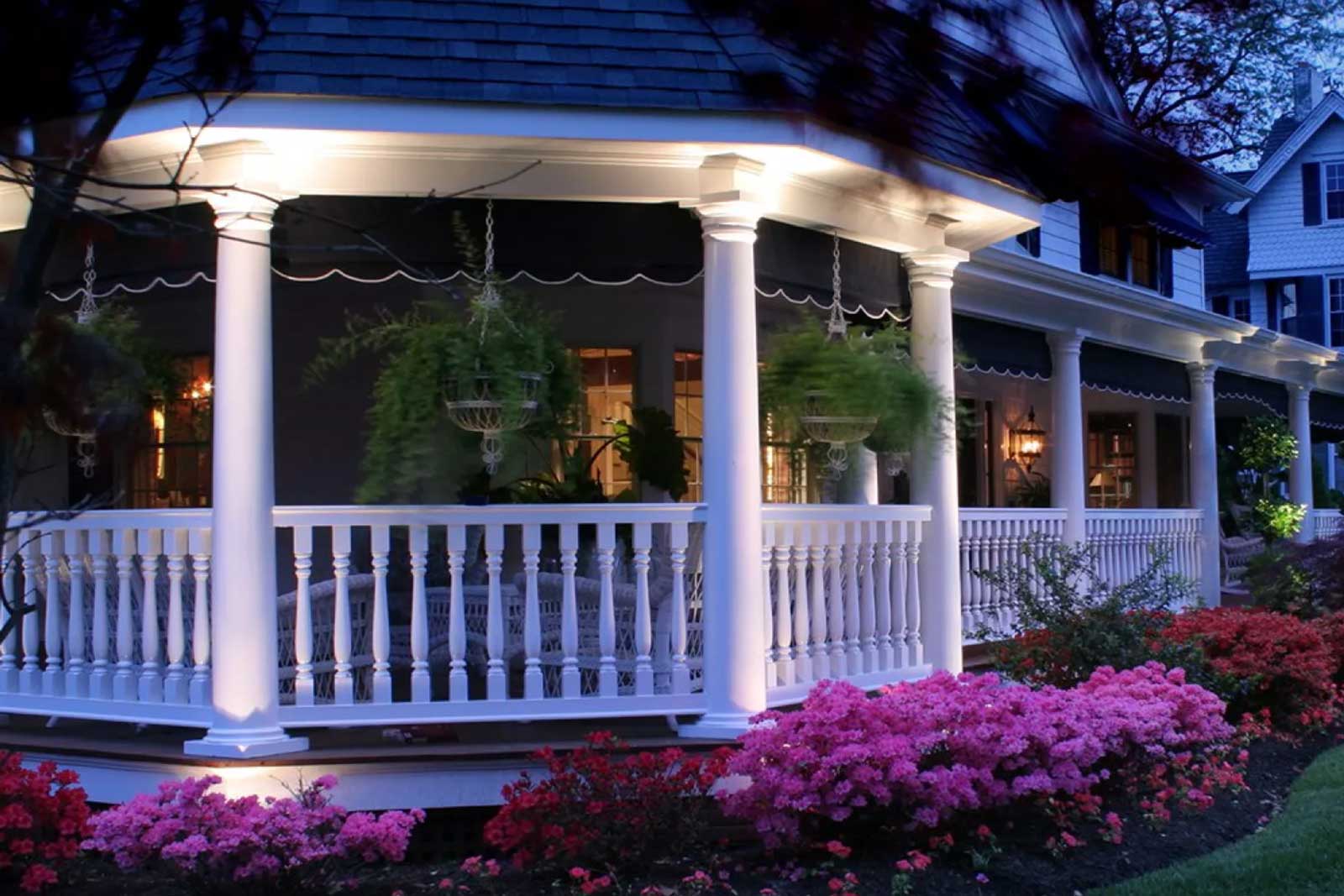 gazebo-lit-up-at-night-with-purple-flowers